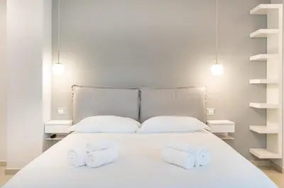 Letto o letti in una camera di Mirabilia 108 - Poetto beach