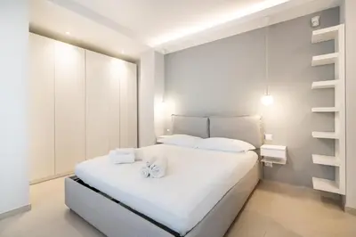 Letto o letti in una camera di Mirabilia 108 - Poetto beach