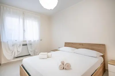 Letto o letti in una camera di Mirabilia 108 - Poetto beach