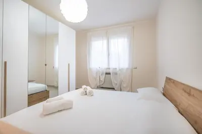 Letto o letti in una camera di Mirabilia 108 - Poetto beach