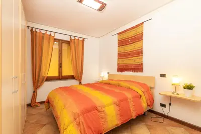 Letto o letti in una camera di Casa il grande Carrubo