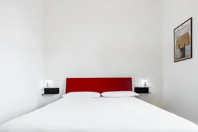 Letto o letti in una camera di Al Dio Bes