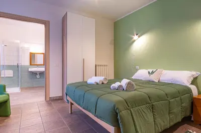 Letto o letti in una camera di Locanda Sighimi