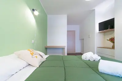 Letto o letti in una camera di Locanda Sighimi