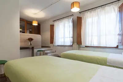 Letto o letti in una camera di Locanda Sighimi