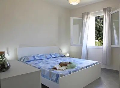 Letto o letti in una camera di Casa Bianca Marea