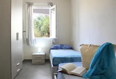 Letto o letti in una camera di Casa Bianca Marea