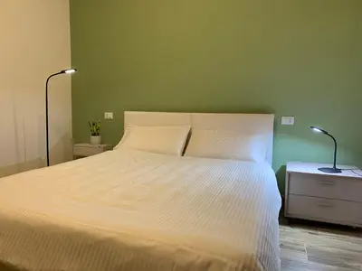 Letto o letti in una camera di DIMORE IN residenze asproni 24