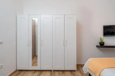 Letto o letti in una camera di DIMORE IN residenze asproni 24