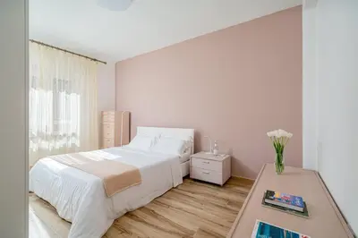 Letto o letti in una camera di DIMORE IN residenze asproni 24