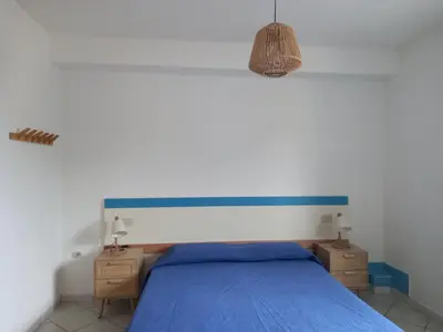 Letto o letti in una camera di Villa Acquamarina