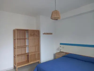 Letto o letti in una camera di Villa Acquamarina