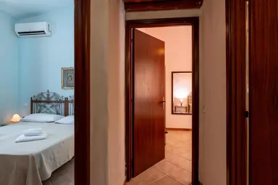 Letto o letti in una camera di Domu de Claudio