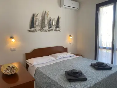 Letto o letti in una camera di Casita Porto Pino