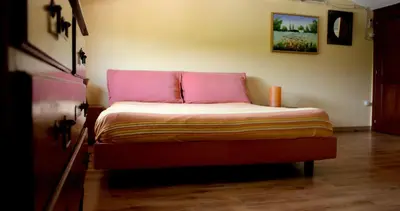 Letto o letti in una camera di Domus Sol Aria