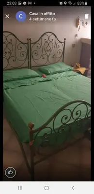 Letto o letti in una camera di Casa vacanze Cagliari,