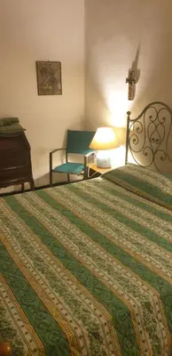 Letto o letti in una camera di Casa vacanze Cagliari,