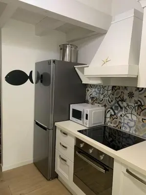 Cucina o angolo cottura di Residence Elegance Villa La Sterlizia Porto Pino