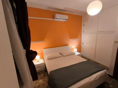 Letto o letti in una camera di Casa Flavio