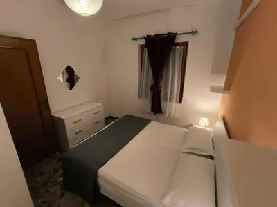 Letto o letti in una camera di Casa Flavio