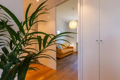 Letto o letti in una camera di Sunichele Luxury Apartment
