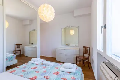Letto o letti in una camera di Sunichele Luxury Apartment