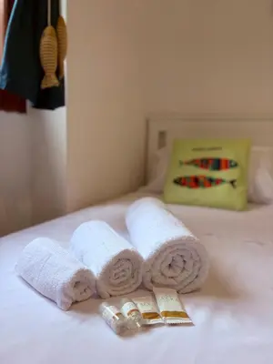 Letto o letti in una camera di Villetta indipendente Simius