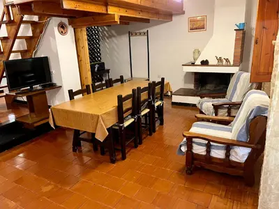 TV o dispositivi per l'intrattenimento presso Villetta Porto Pino 30 mt dalla spiaggia