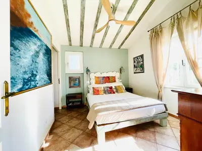 Letto o letti in una camera di Casa Priscilla