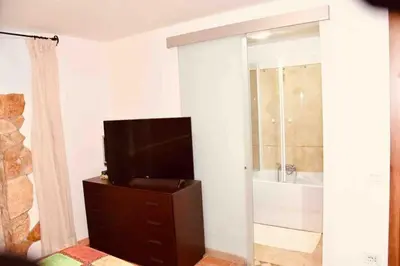 TV o dispositivi per l'intrattenimento presso Apartment in Villa, Beach 3 minutes walk, spiaggia 3 minuti a piedi