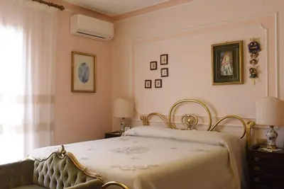 Letto o letti in una camera di Luminoso e accogliente appartamento AGO & ANTO