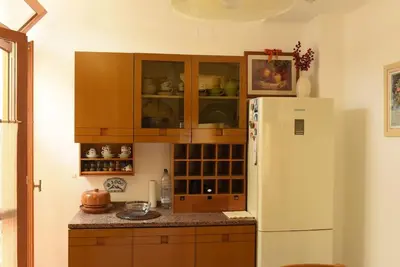Cucina o angolo cottura di Luminoso e accogliente appartamento AGO & ANTO