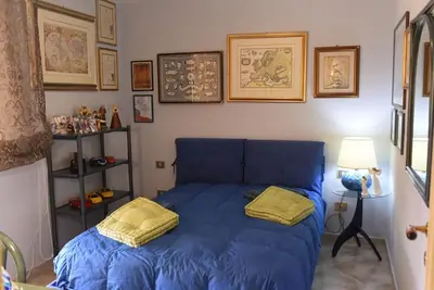 Letto o letti in una camera di Luminoso e accogliente appartamento AGO & ANTO