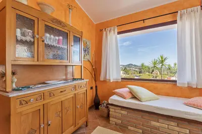 Letto o letti in una camera di Villa Favola indipendente con piscina