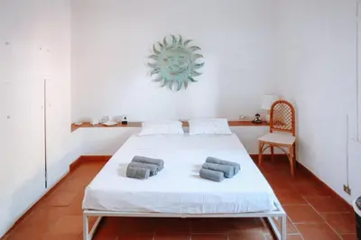 Letto o letti in una camera di Casa di Giò