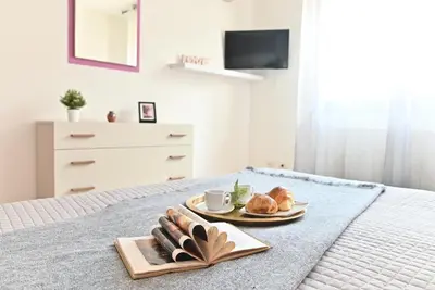Letto o letti in una camera di IzzHome Njoy