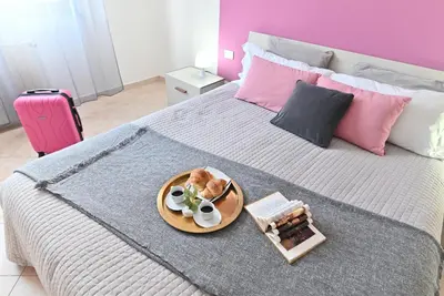 Letto o letti in una camera di IzzHome Njoy