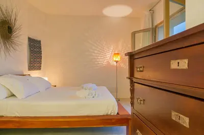 Letto o letti in una camera di Casa Lalita con piscina Sardegna