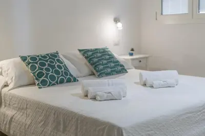 Letto o letti in una camera di Villa Elena - Affitti Brevi Italia