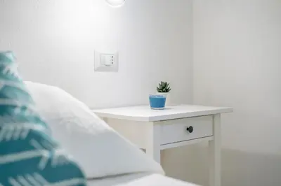 Letto o letti in una camera di Villa Elena - Affitti Brevi Italia