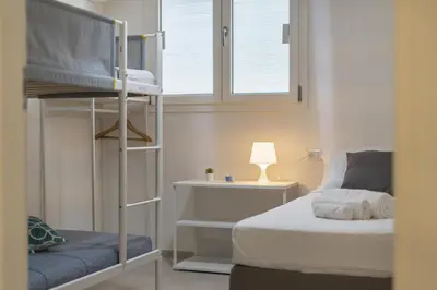 Letto o letti in una camera di Villa Elena - Affitti Brevi Italia
