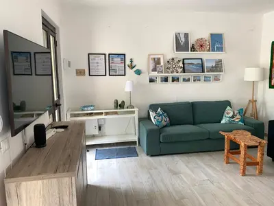 Area soggiorno di Villa del Brigante, 200m from the beach, 80m², 2 bedrooms, 4-5 persons