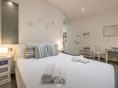 Letto o letti in una camera di Studio 73 e 74