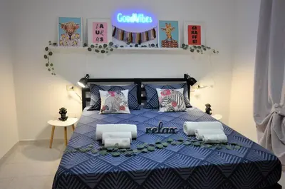 Letto o letti in una camera di Villa Settimia a 50 mt dalla spiaggia!