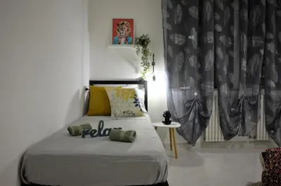 Letto o letti in una camera di Villa Settimia a 50 mt dalla spiaggia!