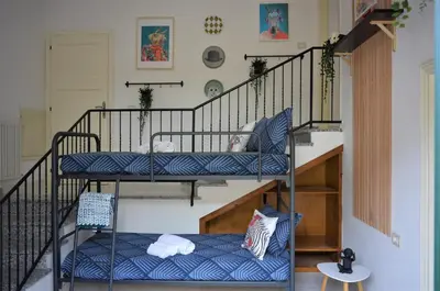 Letto o letti in una camera di Villa Settimia a 50 mt dalla spiaggia!