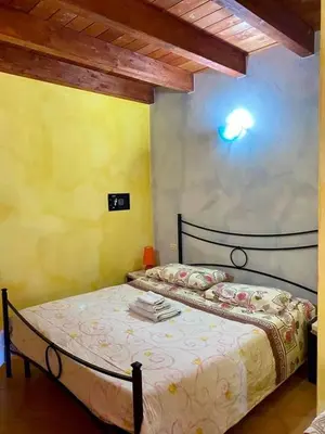 Letto o letti in una camera di Agriturismo Su Niu