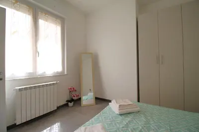 Letto o letti in una camera di Casa Anna Cagliari