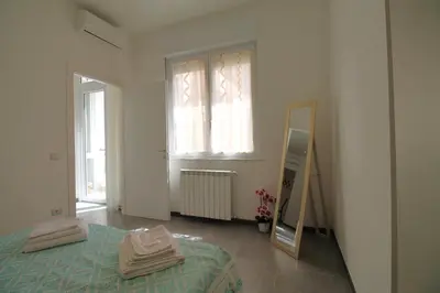 Letto o letti in una camera di Casa Anna Cagliari