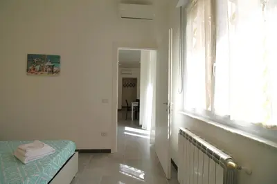 Letto o letti in una camera di Casa Anna Cagliari
